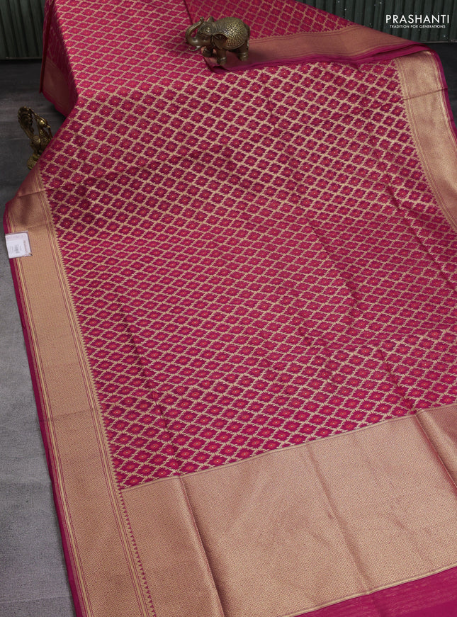 Banarasi silk cotton saree reddish pink with allover zari weaves & thread woven buttas and temple zari woven border