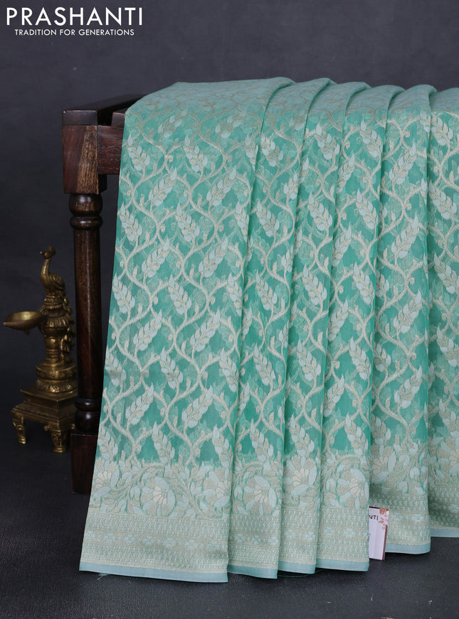 Banarasi silk cotton saree teal green with allover zari weaves and thread & zari woven border