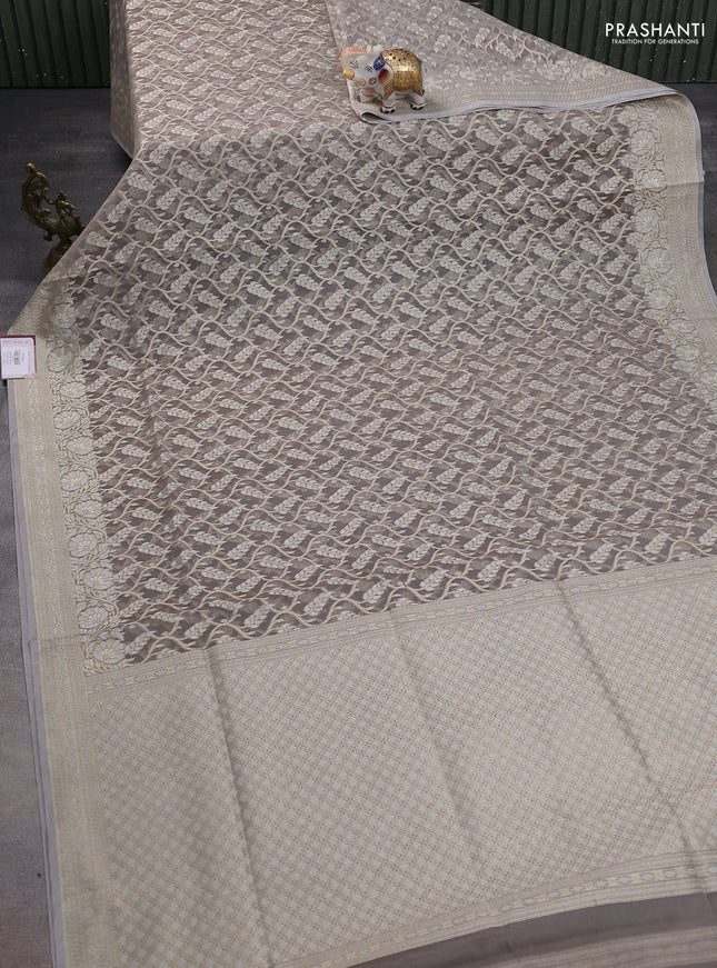 Banarasi silk cotton saree grey with allover zari weaves and thread & zari woven border