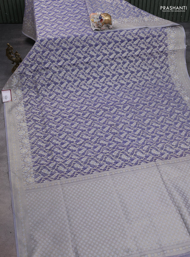 Banarasi silk cotton saree lavender shade with allover zari weaves and thread & zari woven border