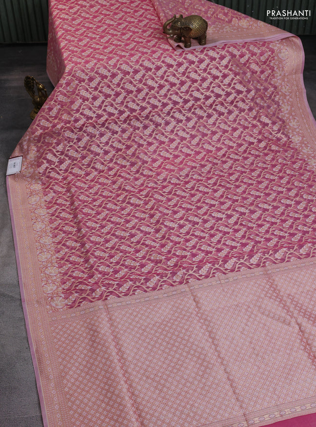 Banarasi silk cotton saree peach pink with allover zari weaves and thread & zari woven border