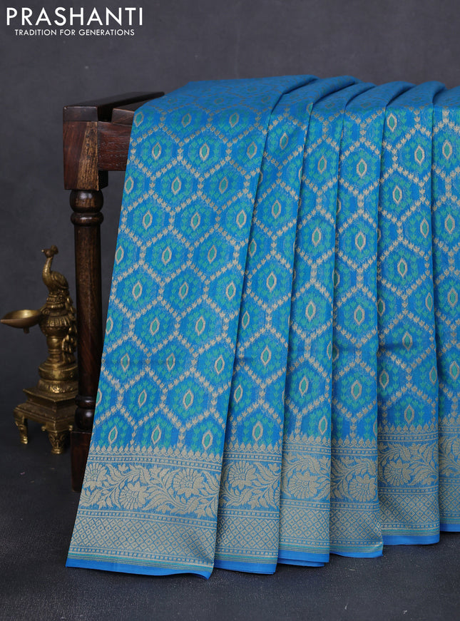 Banarasi silk cotton saree cs blue with allover thread & zari woven buttas and zari woven border