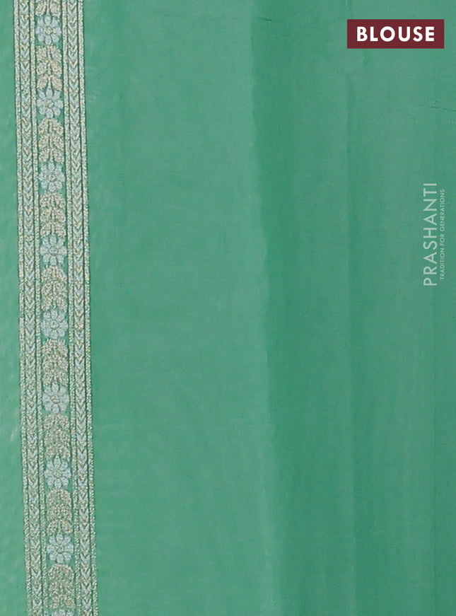 Banarasi silk cotton saree teal green with allover zari weaves and zari woven border
