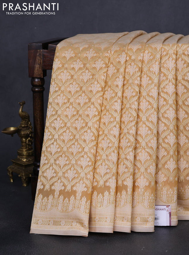 Banarasi silk cotton saree sandal with allover zari weaves and zari woven border