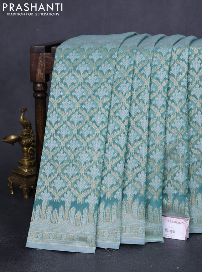 Banarasi silk cotton saree teal blue with allover zari weaves and zari woven border