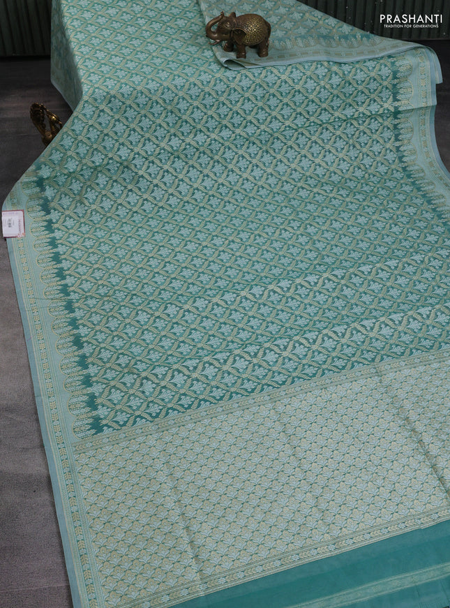 Banarasi silk cotton saree teal blue with allover zari weaves and zari woven border