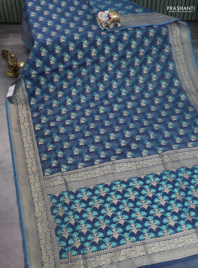 Banarasi silk cotton saree blue with allover floral zari woven buttas and zari woven border