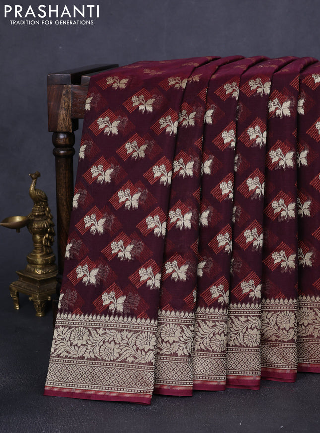 Banarasi silk cotton saree deep maroon with allover floral zari woven buttas and zari woven border