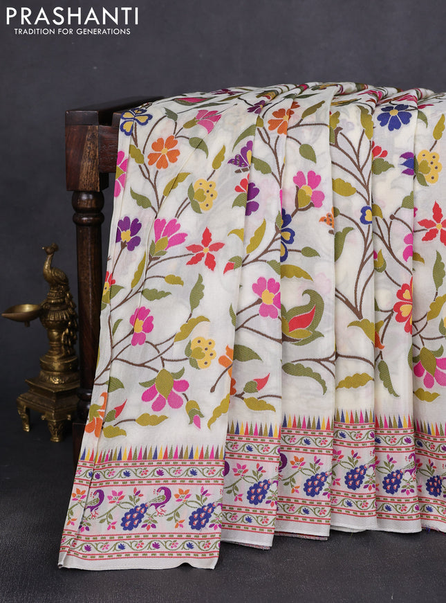 Dola silk saree off white with allover jamdhani thread weaves and peacock design thread woven border