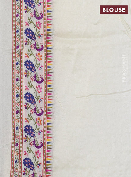 Dola silk saree off white with allover jamdhani thread weaves and peacock design thread woven border