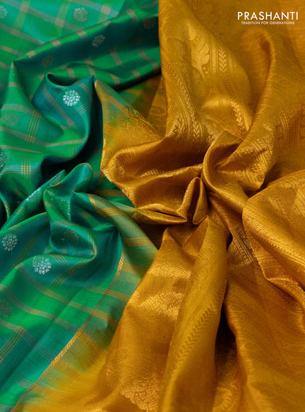 Pure gadwal silk saree teal bluish green and dark mustard with allover checks & zari buttas and temple design zari woven border