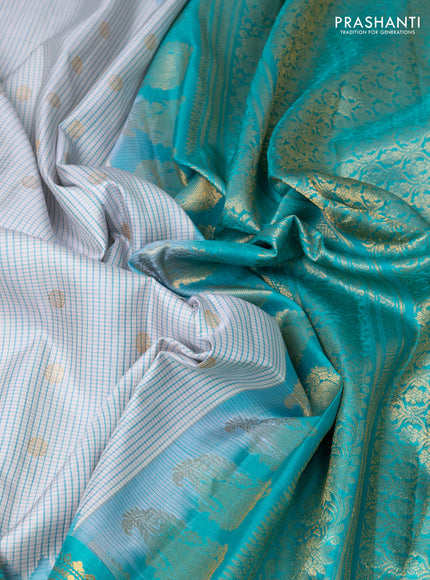 Pure gadwal silk saree cream and teal blue with allover small checks & zari buttas and temple design zari woven border