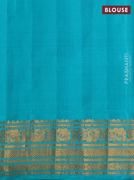 Pure gadwal silk saree cream and teal blue with allover small checks & zari buttas and temple design zari woven border