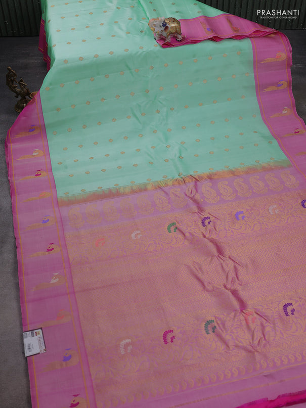 Pure gadwal silk saree teal green shade and pink with zari woven buttas and zari woven peacock butta border