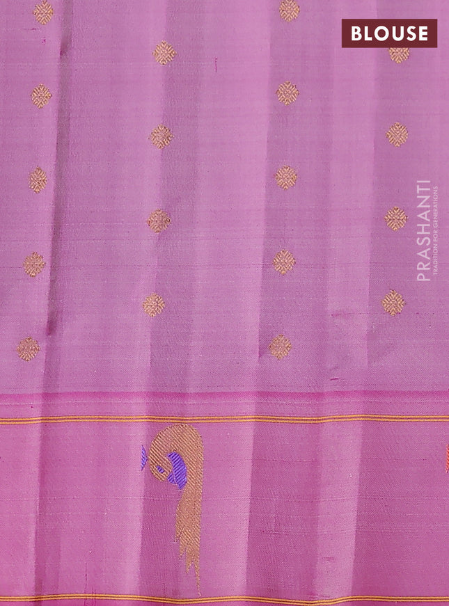 Pure gadwal silk saree teal green shade and pink with zari woven buttas and zari woven peacock butta border