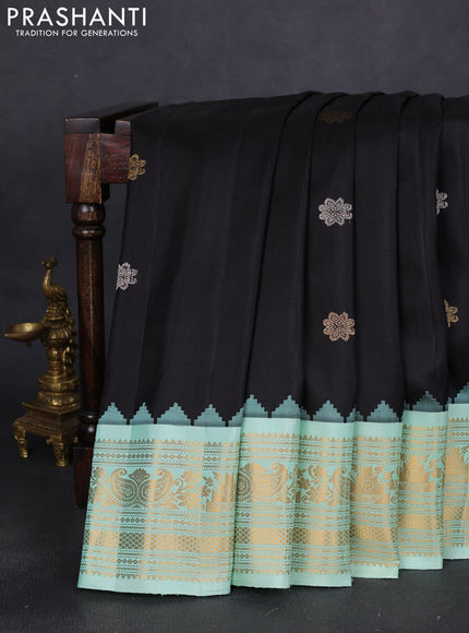 Pure gadwal silk saree black and teal green shade with silver & gold zari woven buttas and temple design zari woven border