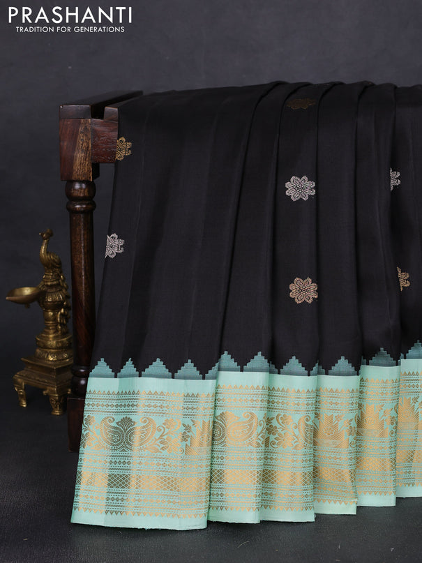 Pure gadwal silk saree black and teal green shade with silver & gold zari woven buttas and temple design zari woven border
