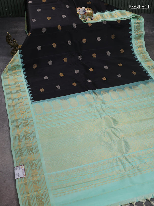 Pure gadwal silk saree black and teal green shade with silver & gold zari woven buttas and temple design zari woven border