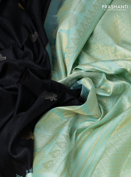 Pure gadwal silk saree black and teal green shade with silver & gold zari woven buttas and temple design zari woven border