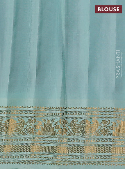 Pure gadwal silk saree black and teal green shade with silver & gold zari woven buttas and temple design zari woven border