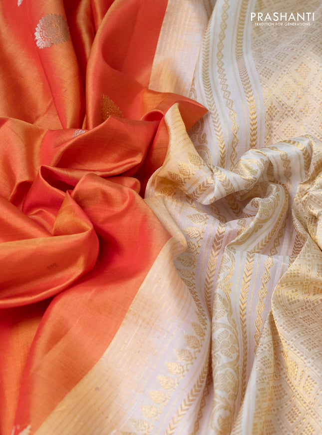 Pure gadwal silk saree dual shade of pinkish peach orange and off white with silver & gold zari woven buttas and temple design rettapet zari woven butta border