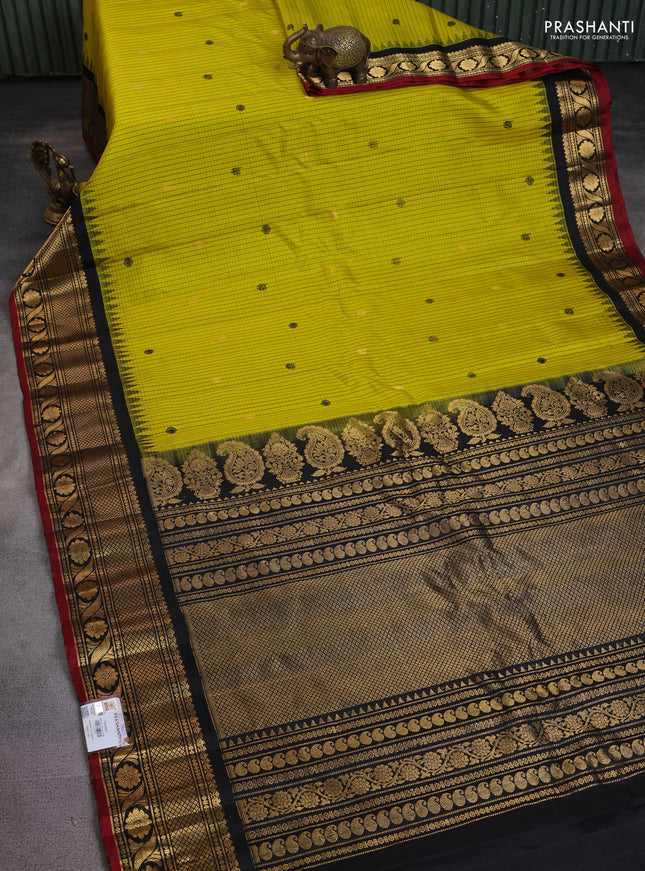 Pure gadwal silk saree yellow and black with allover checks & buttas and temple design zari woven border