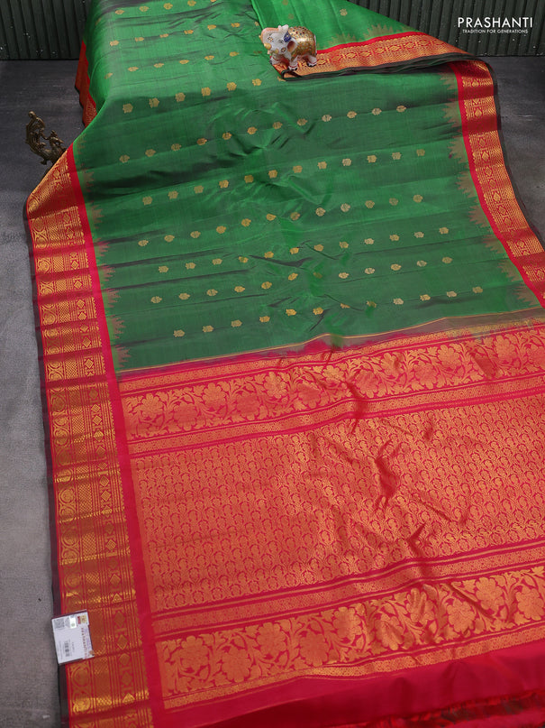 Pure gadwal silk saree green and pink with zari woven buttas and temple design zari woven border