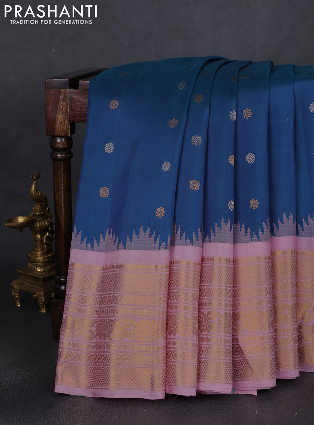 Pure gadwal silk saree dual shade of bluish green and light pink with silver & gold zari woven buttas and temple design zari woven border