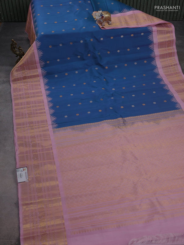 Pure gadwal silk saree dual shade of bluish green and light pink with silver & gold zari woven buttas and temple design zari woven border