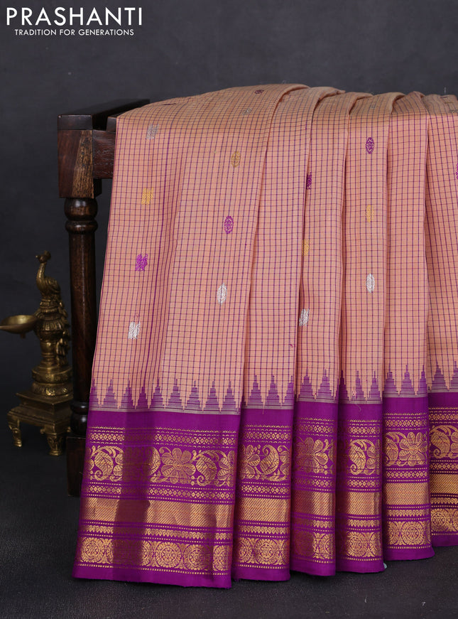 Pure gadwal silk saree peach orange and purple with allover checks & buttas and temple design zari woven border
