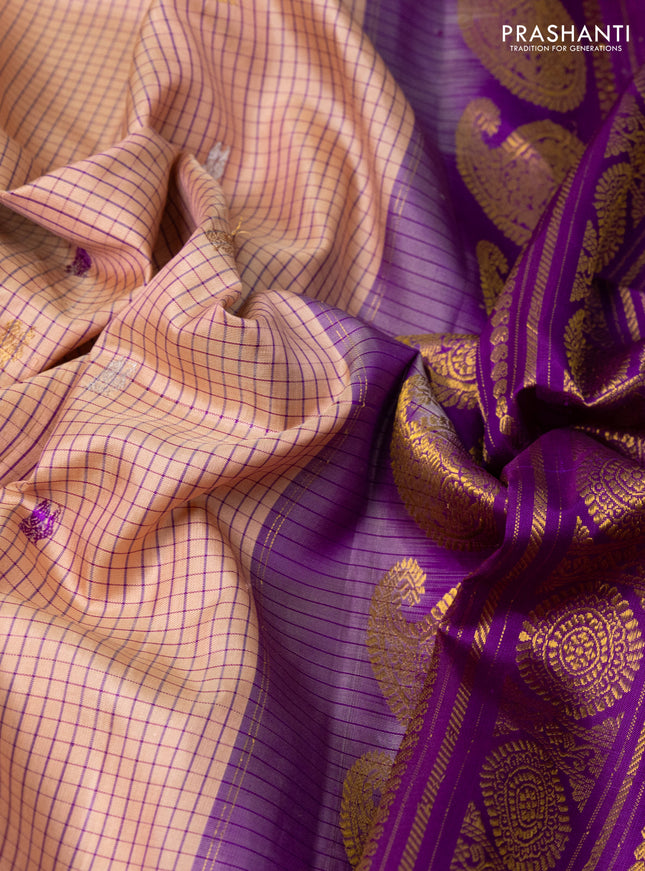 Pure gadwal silk saree peach orange and purple with allover checks & buttas and temple design zari woven border