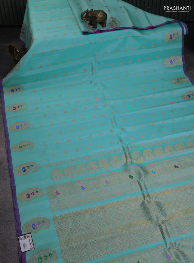 Pure gadwal silk saree light blue with zari woven buttas and paisley zari woven butta border