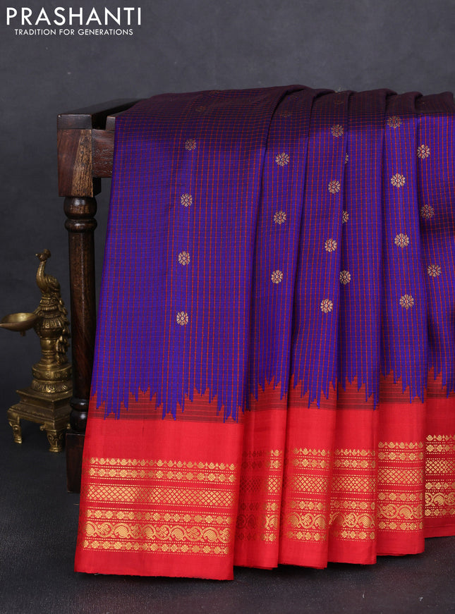 Pure gadwal silk saree blue and red with allover checks & buttas and temple design zari woven border