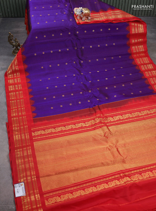 Pure gadwal silk saree blue and red with allover checks & buttas and temple design zari woven border