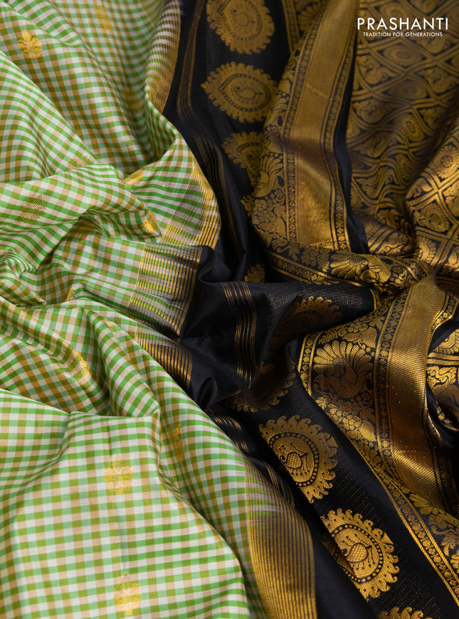 Pure gadwal silk saree multi colour and green black with allover small checks & zari buttas and temple design zari woven border