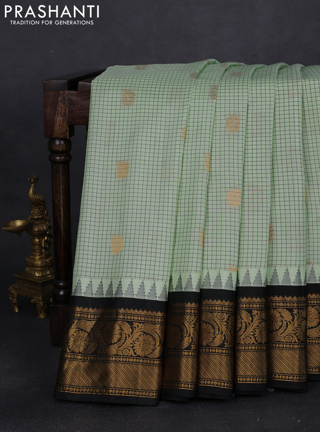 Pure gadwal silk saree pista green and black with allover checks & zari buttas and temple design floral zari woven border