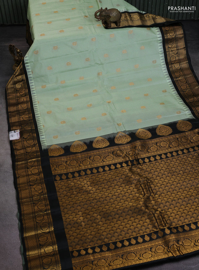 Pure gadwal silk saree pista green and black with allover checks & zari buttas and temple design floral zari woven border