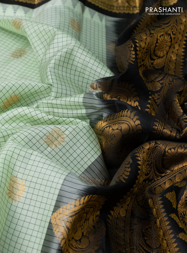 Pure gadwal silk saree pista green and black with allover checks & zari buttas and temple design floral zari woven border