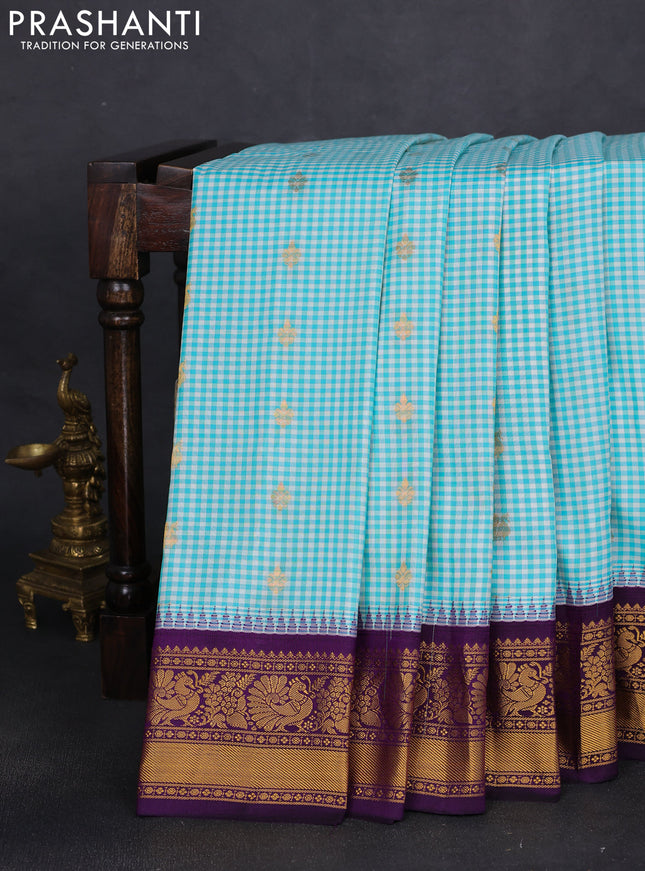 Pure gadwal silk saree off white teal blue and purple with allover small checks & zari buttas and temple design annam zari woven border