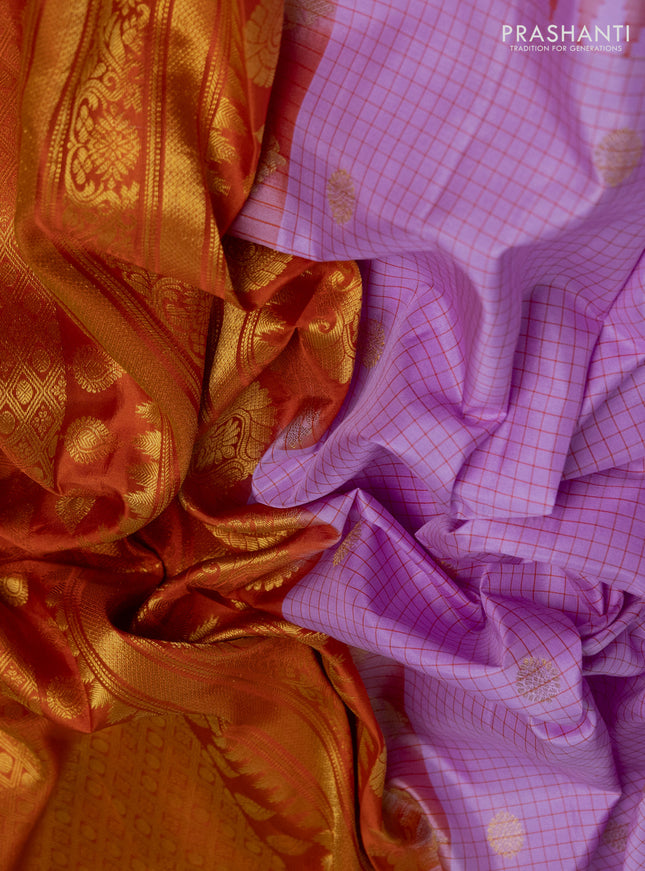 Pure gadwal silk saree mild lavender and rustic orange with allover small checks & zari buttas and temple design zari woven border