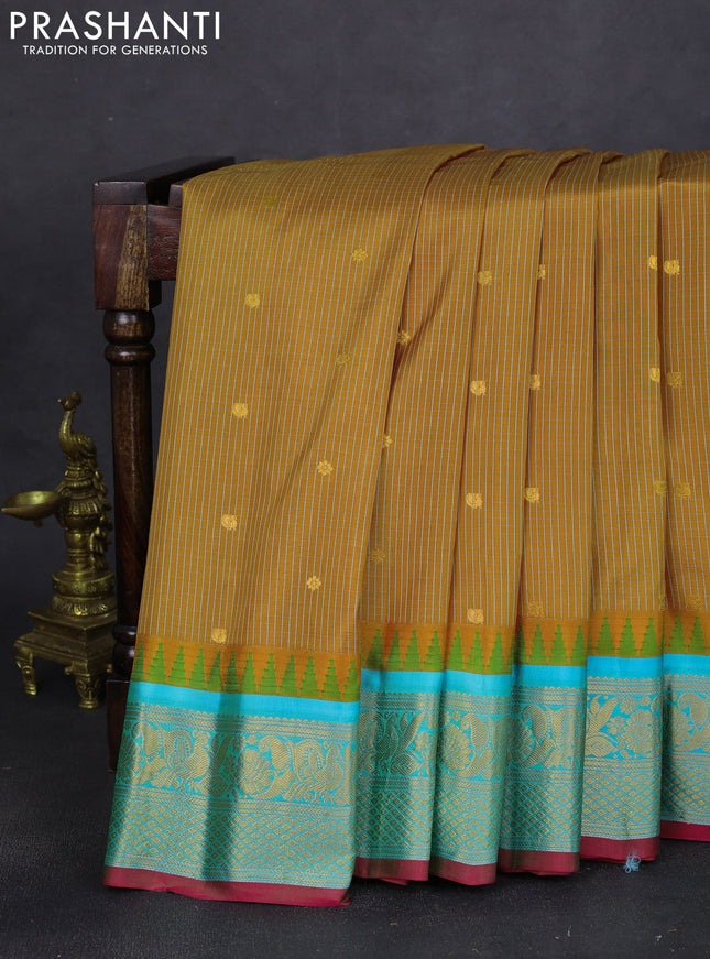 Pure gadwal silk saree dark mustard and teal green with allover checks & zari buttas and temple design zari woven border