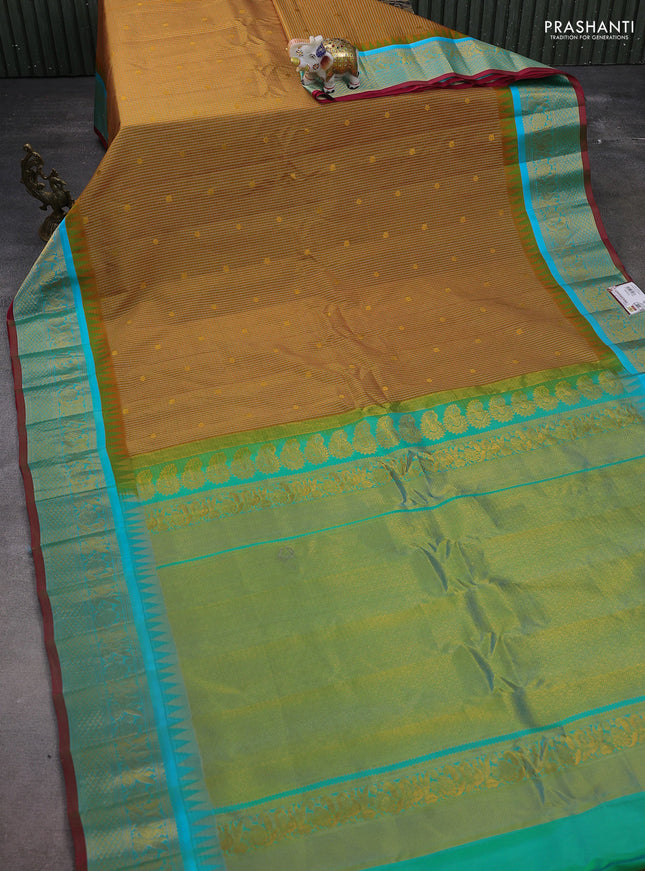 Pure gadwal silk saree dark mustard and teal green with allover checks & zari buttas and temple design zari woven border