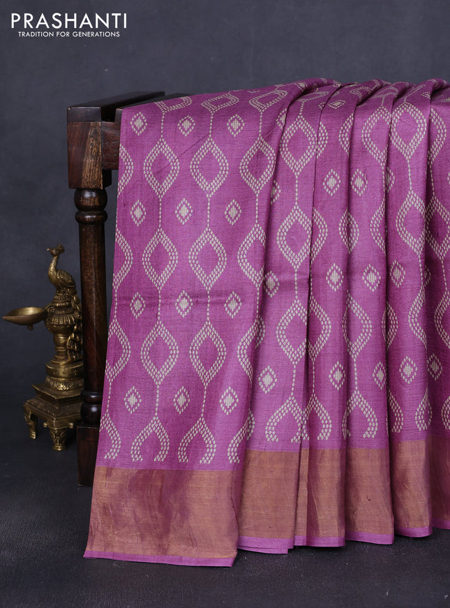 Pure tussar saree mauve pink with allover prints and zari woven border