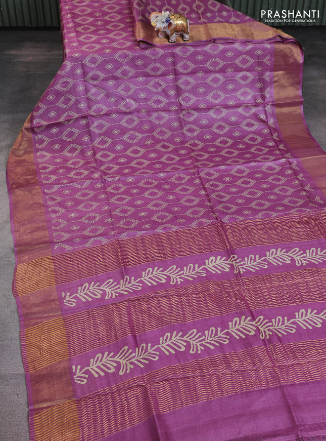 Pure tussar saree mauve pink with allover prints and zari woven border