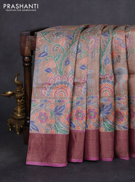 Pure tussar saree sandal and purple with allover kalamkari prints and zari woven border