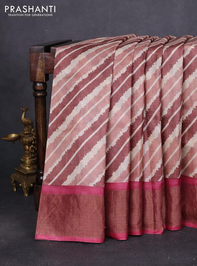 Pure tussar saree multi colour and pink with allover leheriya prints and zari woven border