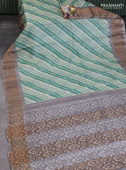 Pure tussar saree green and grey shade with allover leheriya prints and zari woven border
