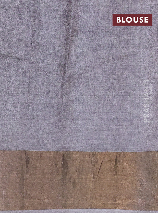 Pure tussar saree green and grey shade with allover leheriya prints and zari woven border