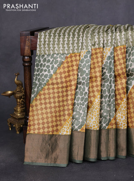 Pure tussar saree green with allover prints and zari woven border