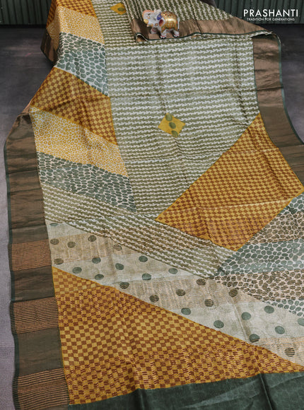 Pure tussar saree green with allover prints and zari woven border